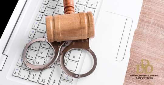 handcuffs and keyboard keys